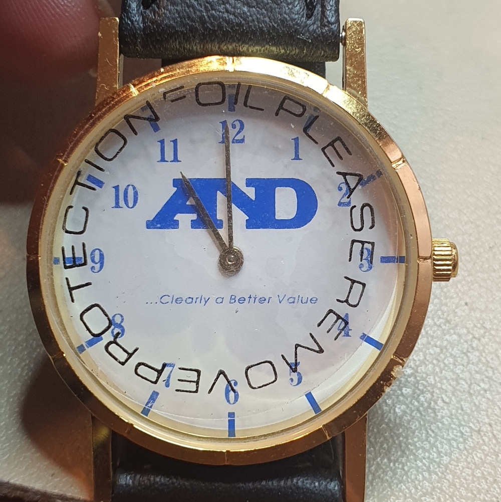 10/$20 AND- Clearly A Better Value Goldtone/White Leather Promo Men's Watch